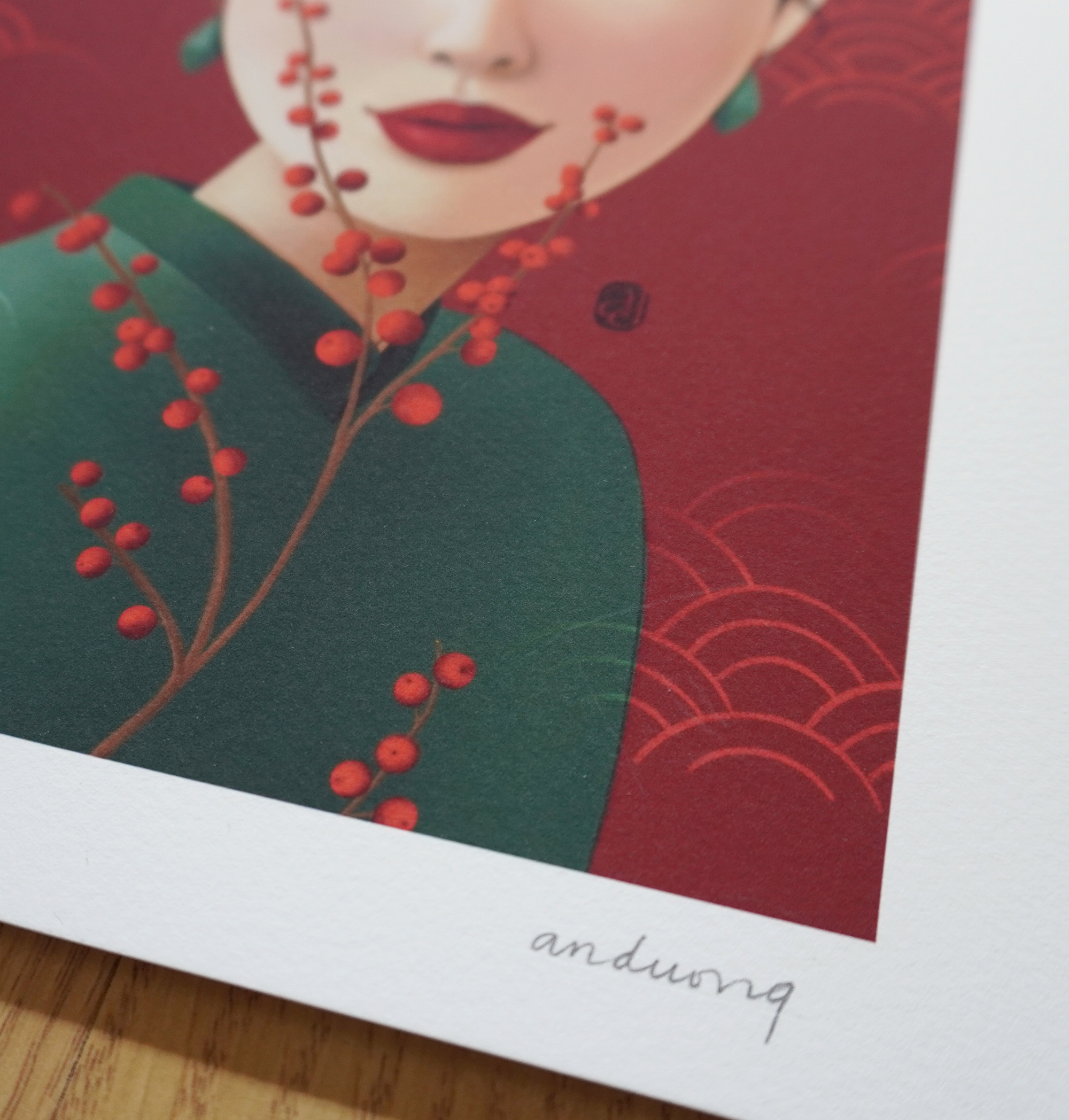 Close up detail of digital brushwork on Crimson fine art print showing holly berries and ao dai collar